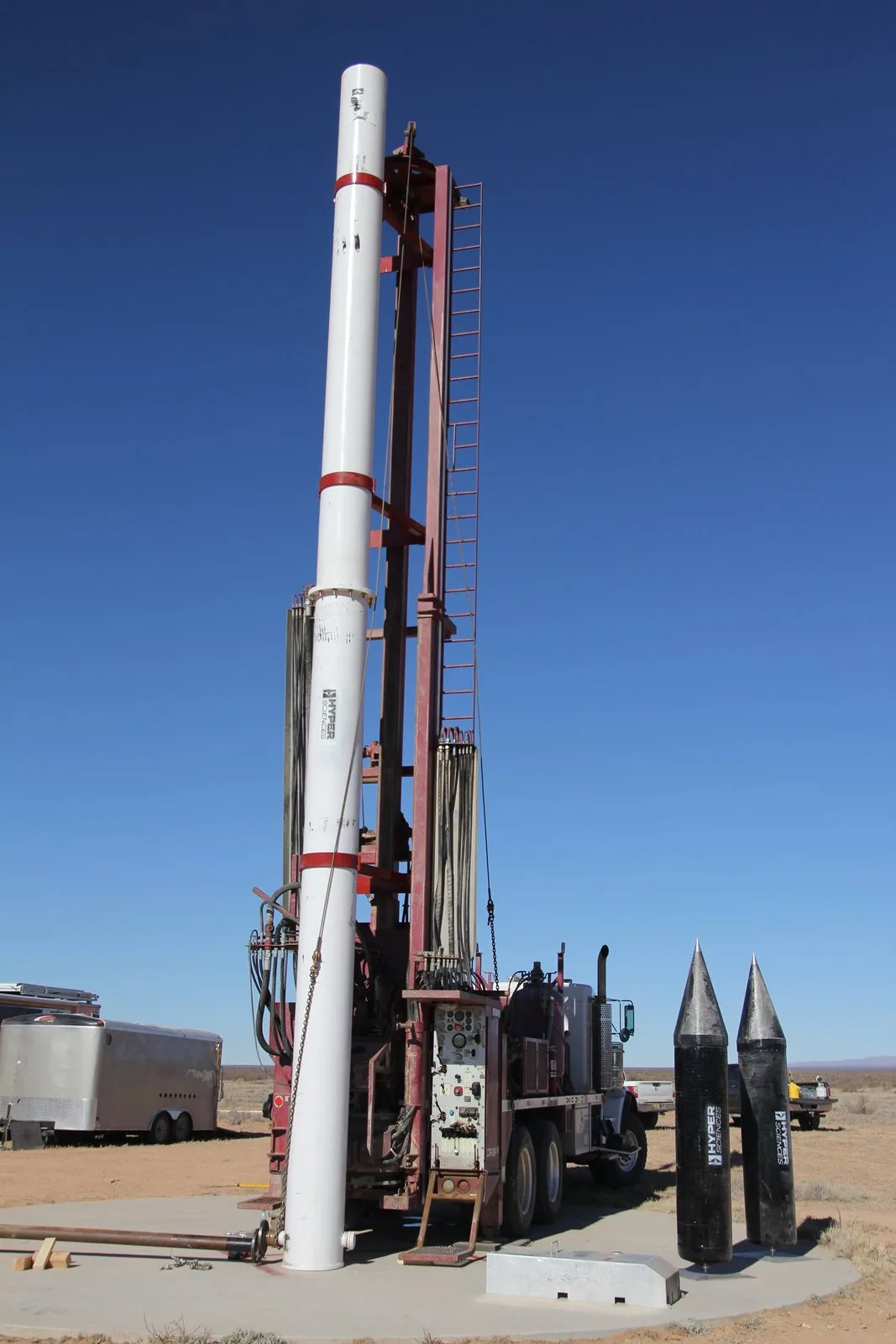 Launcher mounted on the drill rig